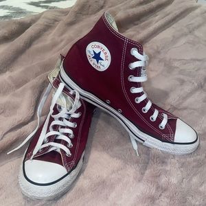 Maroon chuck Taylor’s.